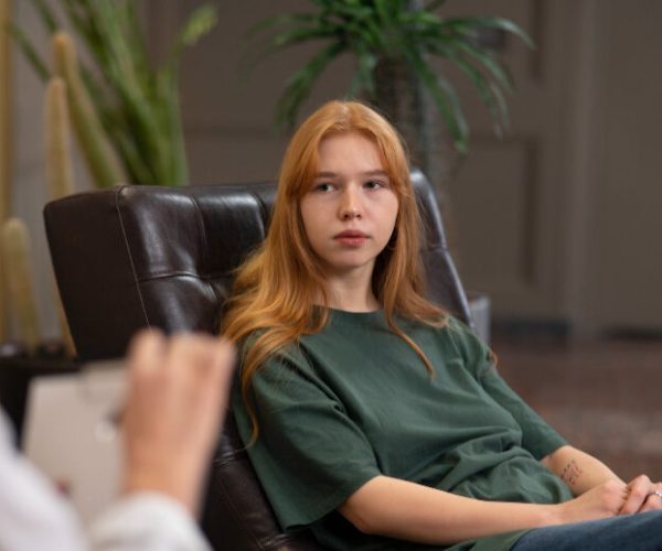 authentic-scene-young-person-undergoing-psychological-therapy